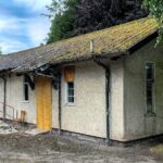 Urban explorer discovers eerie abandoned mortuary with rotting coffins, fridge lockers, and a cobweb-filled chapel. Her chilling find goes viral on TikTok, captivating viewers.