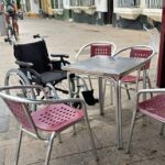 Waiter shocked as customer forgets wheelchair after a night of heavy drinking at a Spanish bar. The bizarre incident went viral, sparking humorous reactions online.