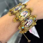 A woman discovered a $25,000 bracelet at a thrift store, dating back to 1835. The antique piece, made of 18k gold, went viral on TikTok, captivating thrifters and history buffs.