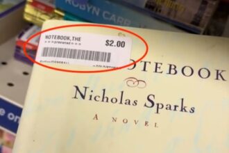 A woman finds a signed first edition of Nicholas Sparks' "The Notebook" for just $2 at a charity shop, potentially worth £300, sparking excitement and disbelief online.