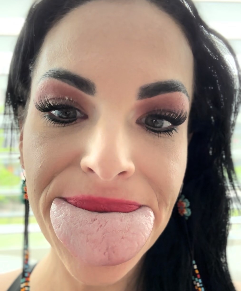 Brittany Lacayo sets a Guinness World Record for the widest tongue at 7.9 cm, nearly the width of a credit card, stunning viewers and earning viral attention online.