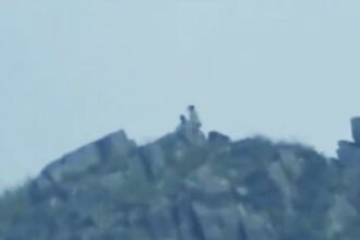 A couple caught in a risqué act on Hong Kong's Lion Rock stunned locals, but many were more impressed by the phone’s incredible zoom power that captured the distant scene.