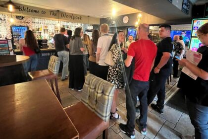 Pub-goers are baffled by a new post-Covid trend of single-file queues in bars, replacing traditional pub etiquette and sparking mixed reactions from Brits across the nation.