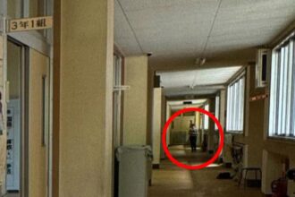 Urban explorer discovers eerie abandoned school frozen in time, with homework still pinned and a ghostly figure lurking in the hallway, sending chills down his spine."