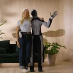 Robotics company 1X plans to release millions of humanoid robots by 2028, designed for daily chores like shopping and cleaning, offering an affordable solution for homes.