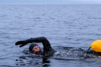 Daredevil Duncan Roberts was terrified during a Loch Ness swim after a mysterious creature bumped into him in the deep, dark waters, fueling fears of the legendary monster.