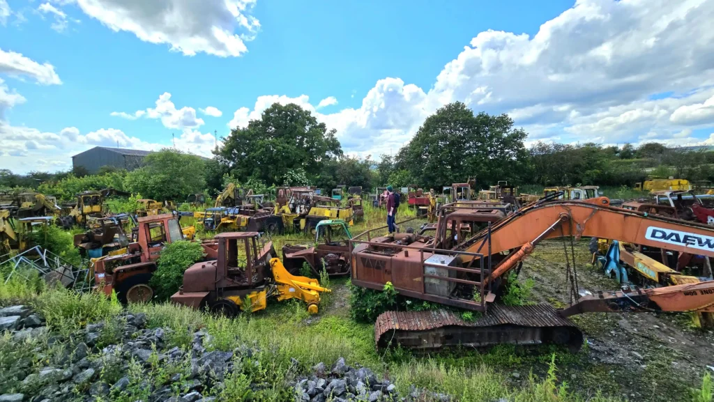 Explorer Daniel Sims uncovers an abandoned field filled with diggers and tractors worth millions in scrap metal and parts, sharing the incredible find with his YouTube followers.