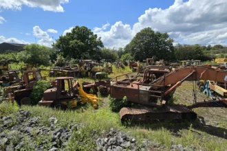 Explorer Daniel Sims uncovers an abandoned field filled with diggers and tractors worth millions in scrap metal and parts, sharing the incredible find with his YouTube followers.