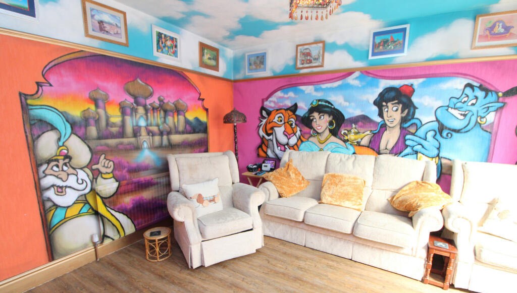 Disney-themed house in Rhyl hits the market, featuring stunning murals, toy-filled rooms, and magical decor from Aladdin to Peter Pan. Listed for £179,950 – a dream home for Disney fans!