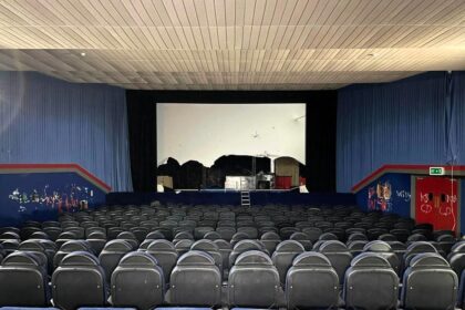 Urban explorer Sean Piper discovers an abandoned 1930s cinema in Canterbury, filled with smashed screens, litter, and eerie vibes, sparking shock and nostalgia online.