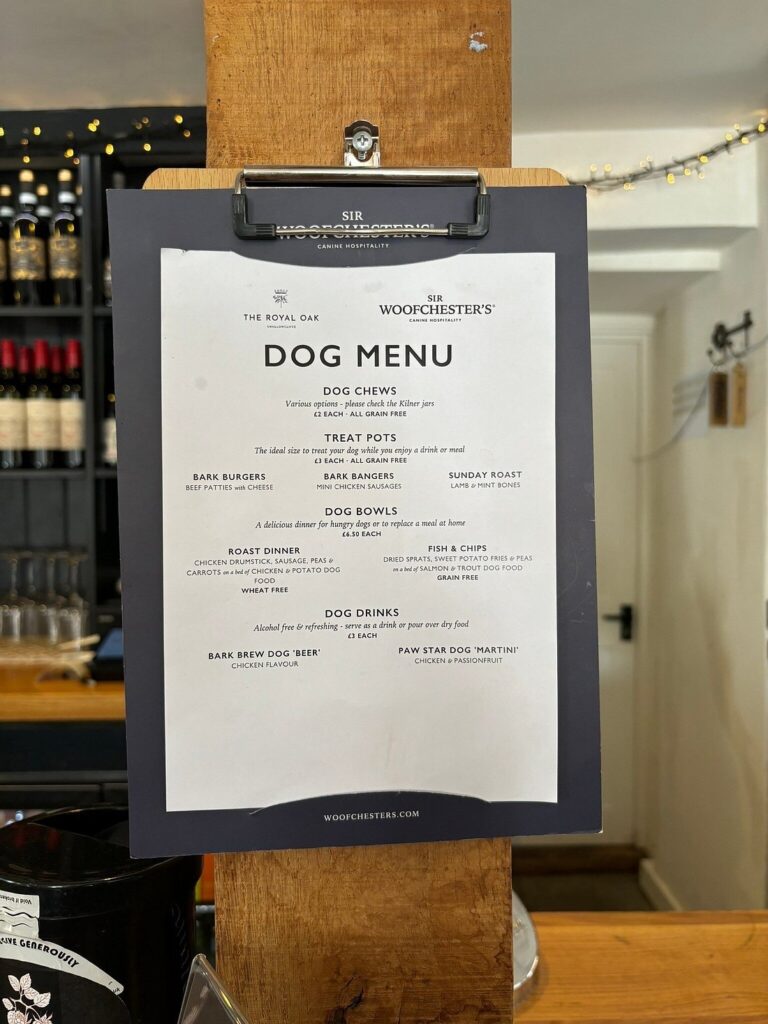 Former Top Gear presenter James May introduces a dog menu at his pub, the Royal Oak, offering canine Sunday roasts, fish and chips, and dog-friendly drinks for furry patrons.