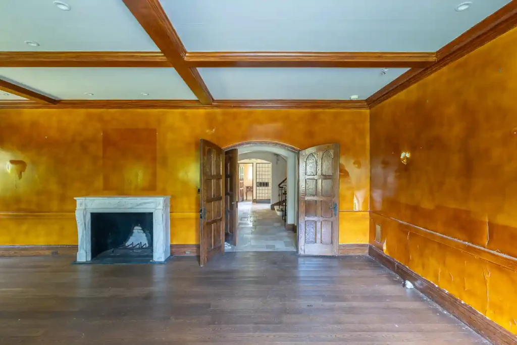 Urban explorer discovers abandoned $8.1M mansion with six bedrooms, pool, and basketball court. Once a luxurious estate, it's now set for demolition, captivating viewers.