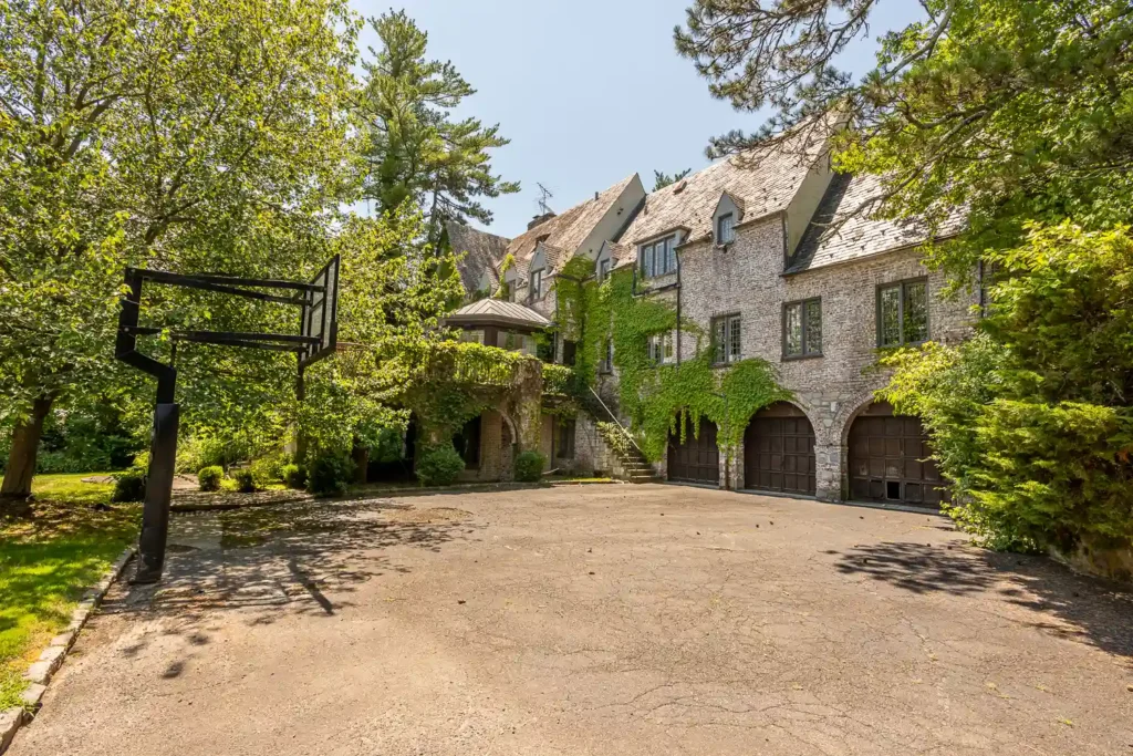 Urban explorer discovers abandoned $8.1M mansion with six bedrooms, pool, and basketball court. Once a luxurious estate, it's now set for demolition, captivating viewers.