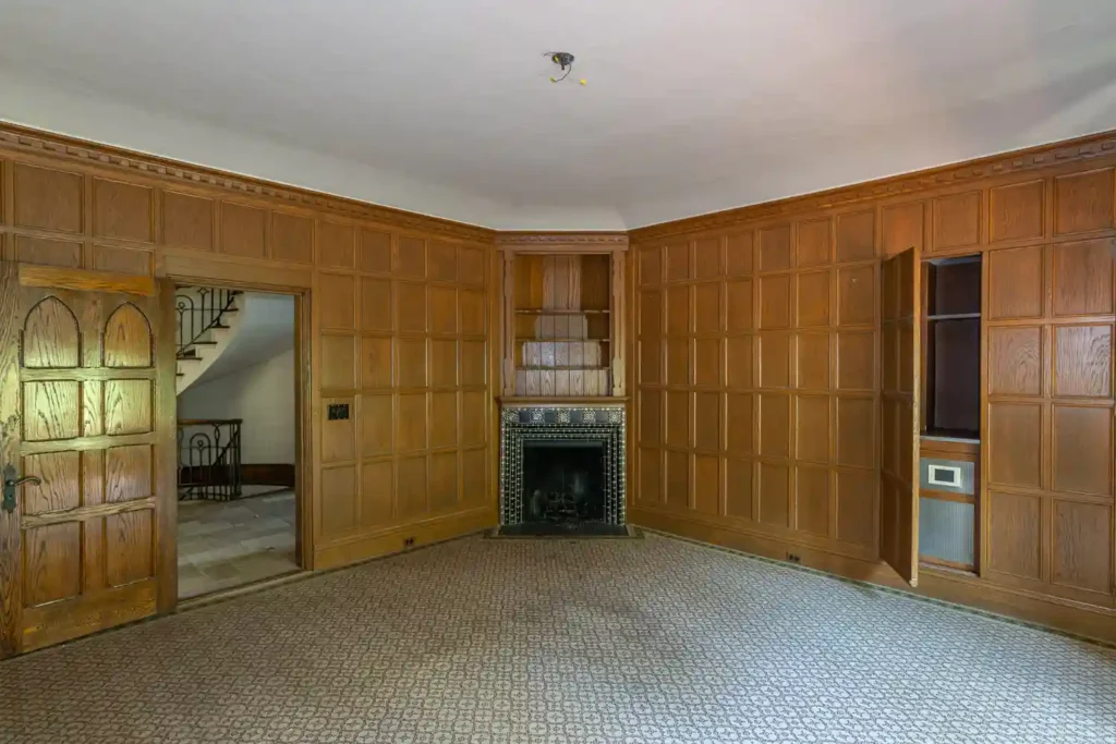 Urban explorer discovers abandoned $8.1M mansion with six bedrooms, pool, and basketball court. Once a luxurious estate, it's now set for demolition, captivating viewers.