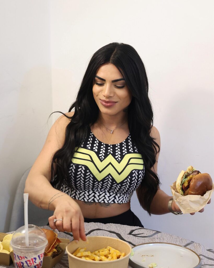 Fitness influencer Vanusa Freitas reveals her extreme monthly food shop of 250 eggs and 15kg of sweet potatoes to maintain her muscular physique, fueling six daily meals.