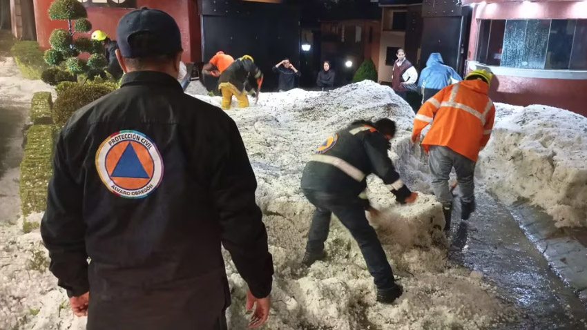 Massive hailstorm blankets Mexico City in icy white, shocking residents with wintry scenes after a hot summer, prompting floods and emergency alerts across the capital.