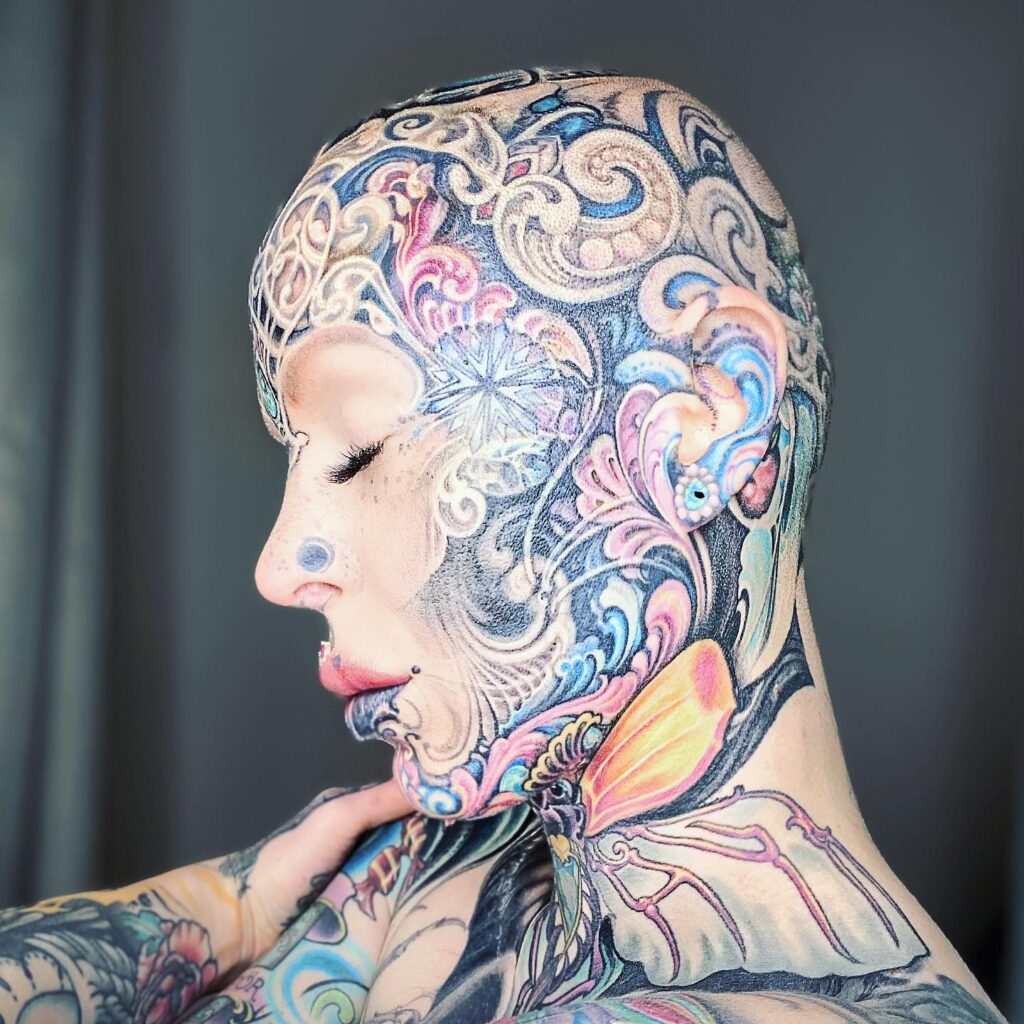 A woman with over 200 tattoos and subdermal implants shares her journey to becoming a 'human cyborg,' facing daily challenges and judgment while expressing her individuality.