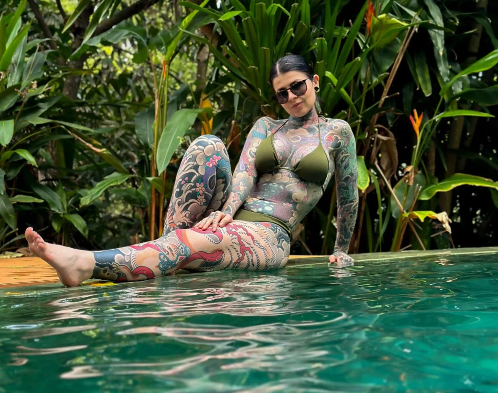 UK’s most tattooed woman, Bethany Moore, covers 98% of her body in ink, boosting confidence and sharing how tattoos make women more adventurous. Discover her bold journey!