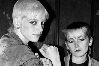 A new photo book, *Looking for Trouble*, offers a rare glimpse into the late 1970s London skinhead scene, featuring over 160 unpublished images by photographer John Ingledew.