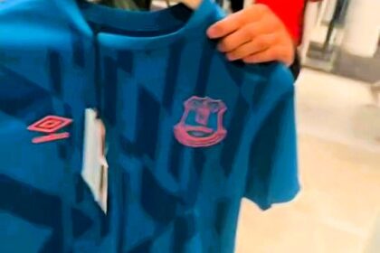 Footy fans are baffled as Selfridges sells a 2019 Everton training top for £195—£155 more than its original price. Fans question the shocking price of the outdated shirt.