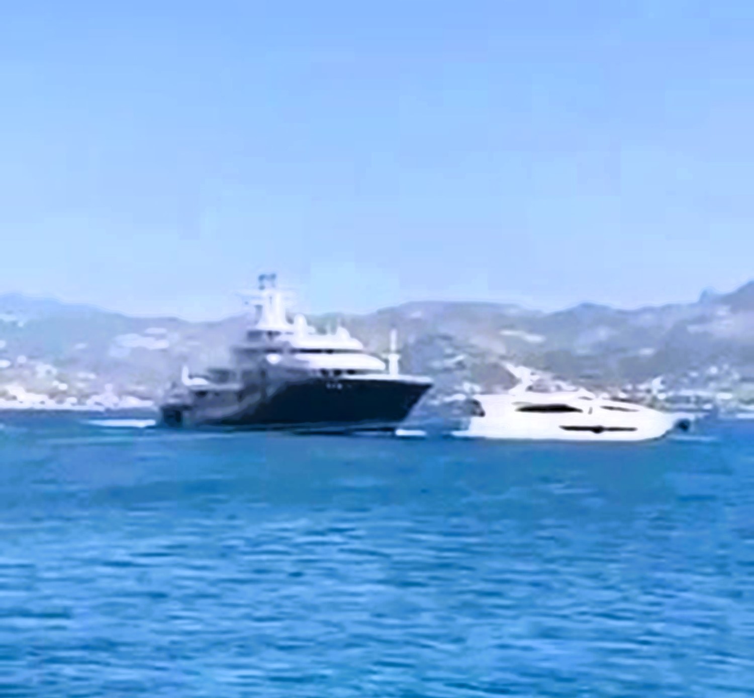 Shocking footage shows a $125m super yacht colliding with a smaller vessel off Bodrum, Turkey. Despite major damage, no injuries reported. Coast Guard investigates.