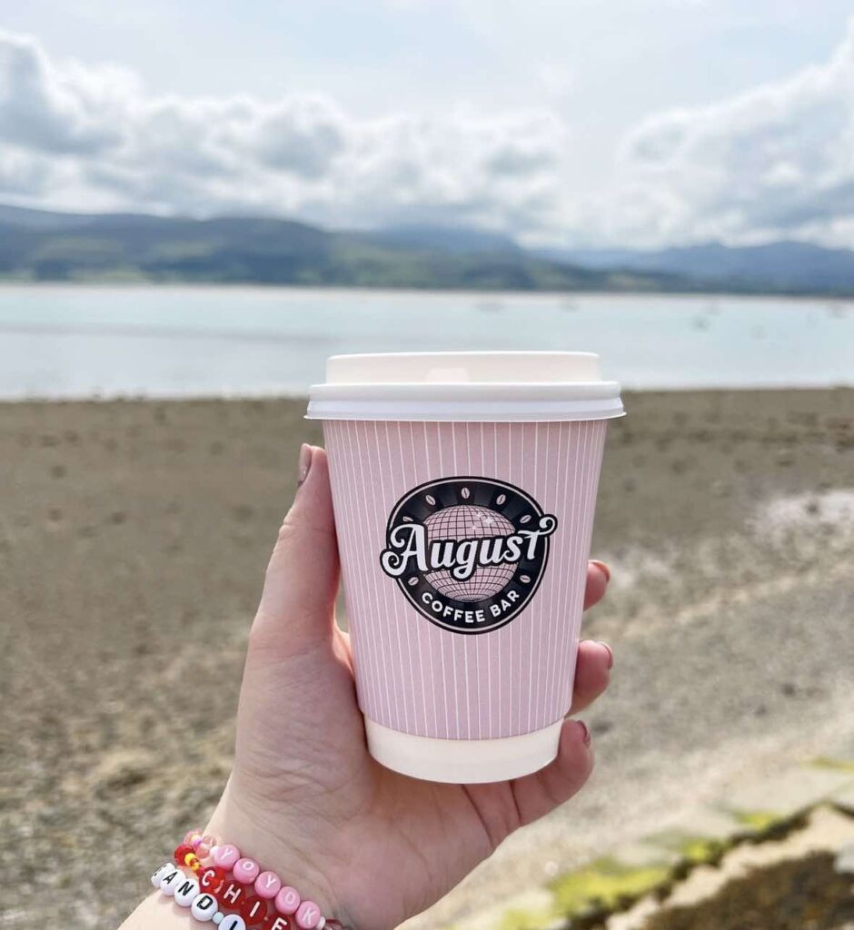 Taylor Swift-themed cafe "August" in Beaumaris, Anglesey attracts Swifties nationwide with themed treats, local goods, and all-day Taylor music, becoming a fan favorite spot.