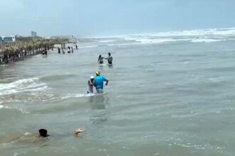 Tourists fled in panic as a mini tsunami hit Playa Miramar in Mexico, caused by Hurricane Francine's storm surge, with powerful waves and flooding seen in shocking footage.