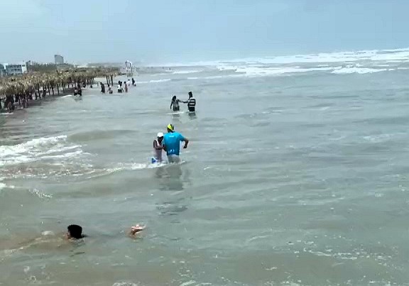 Tourists fled in panic as a mini tsunami hit Playa Miramar in Mexico, caused by Hurricane Francine's storm surge, with powerful waves and flooding seen in shocking footage.