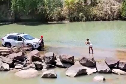 Three women slammed for risky photo shoot at crocodile-infested Cahill's Crossing in Australia, sparking outrage online. The dangerous stunt has gained 198,000 views.