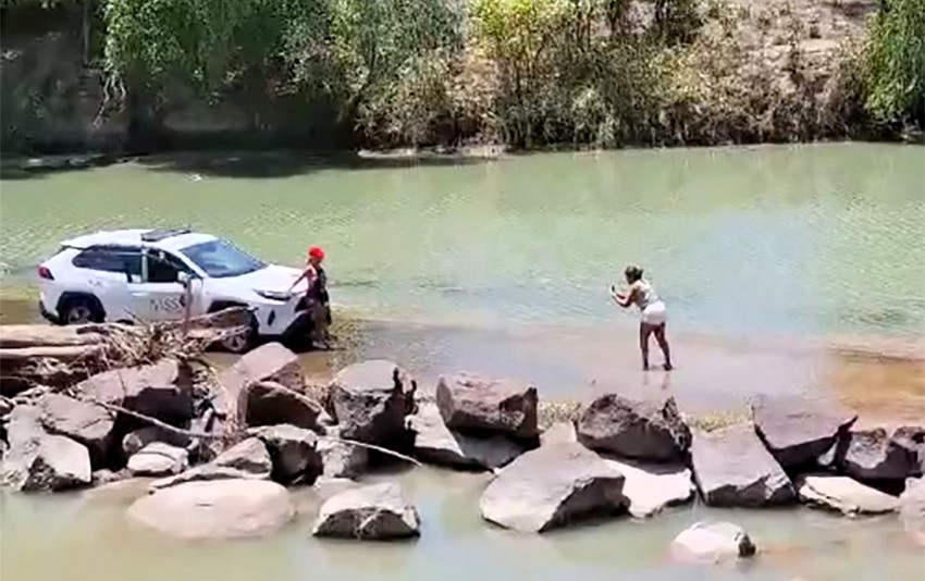 Three women slammed for risky photo shoot at crocodile-infested Cahill's Crossing in Australia, sparking outrage online. The dangerous stunt has gained 198,000 views.