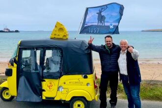 Two dairy founders, David Evans and Kevin Beer, embarked on a 1,600-mile tuk-tuk journey across the UK for BBC Children In Need, raising over £18,000 while showcasing British cheese.