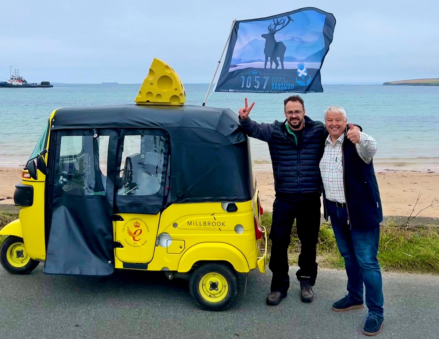 Two dairy founders, David Evans and Kevin Beer, embarked on a 1,600-mile tuk-tuk journey across the UK for BBC Children In Need, raising over £18,000 while showcasing British cheese.