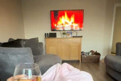 A woman was left mortified after firefighters responded to a false alarm caused by a Yule log video on her TV, mistakenly reported as a fire by a concerned neighbor.