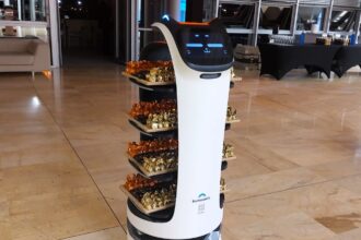 Benidorm hotel introduces robot staff for 'Hotel of the Future,' enhancing guest service with multilingual, automated check-ins and beer-pouring bots for a unique experience.