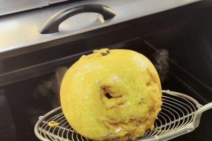 Telford chippy shocks locals by battering and deep-frying a pumpkin for Halloween; viral TikTok leaves viewers divided over this spooky-season ‘delicacy’.