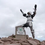 Britain's top female knight, Emma Pearn, scales 3,000ft mountain in full 15th-century armour, raising awareness for The Royal Armouries and women in jousting.