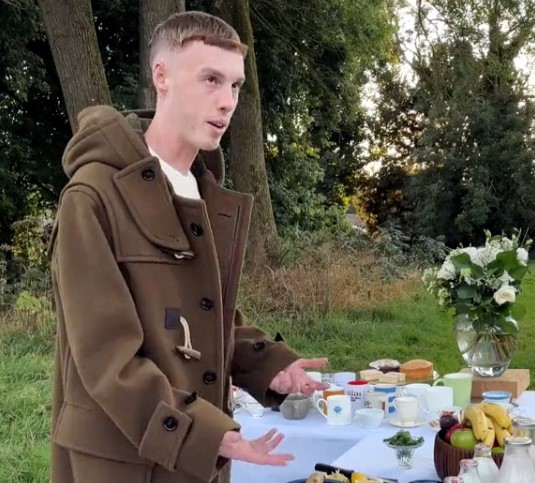 Chelsea star Cole Palmer is teased for resembling Rodney Trotter in a Burberry ad, where fans liken his duffle coat to the iconic sitcom character’s style.