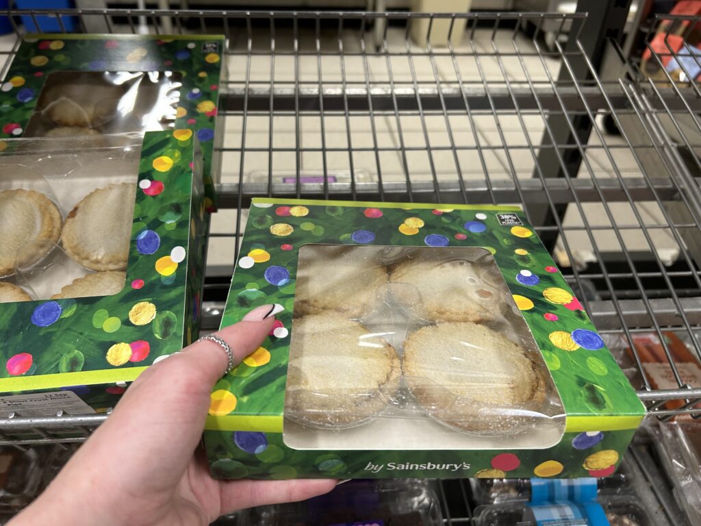 Shoppers are shocked as Christmas food hits Tesco shelves early, with festive treats like mince pies going out-of-date by November, weeks before the holiday season.