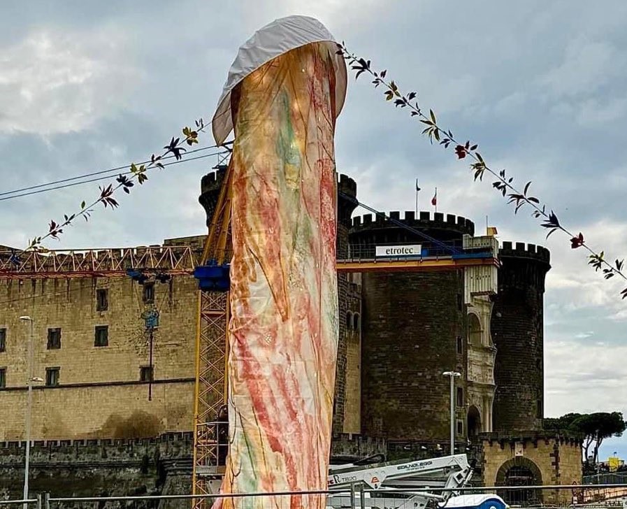 A controversial 39ft phallic monument in Naples' Piazza Municipio sparks outrage and debate, as locals react to late artist Gaetano Pesce's final tribute to his home city.