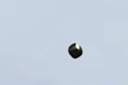 A cube-shaped UFO with flickering lights was spotted hovering over Hualien, Taiwan, sparking intrigue. The mysterious sighting, captured on video, remains unexplained.