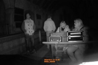 Ghost hunter Tony Ferguson claims a spirit tried to 'lure' his team into the basement of a 17th-century church during a spooky investigation. The team quickly left the site.