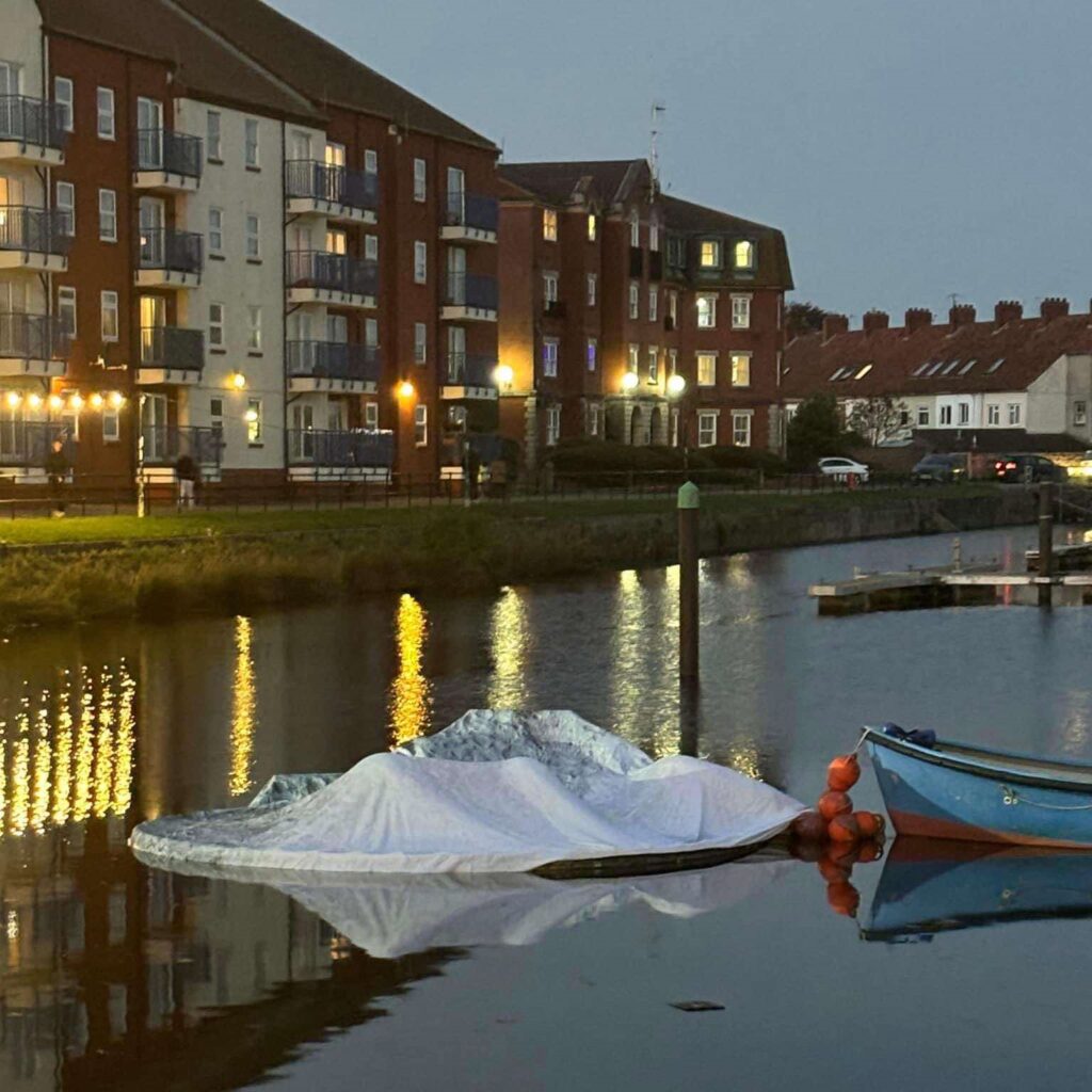 Luke Jerram's 30ft inflatable moon deflates twice due to storm damage in Somerset, cutting short the popular outdoor installation that had attracted over 10,000 visitors.