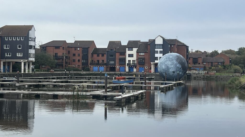 Luke Jerram's 30ft inflatable moon deflates twice due to storm damage in Somerset, cutting short the popular outdoor installation that had attracted over 10,000 visitors.