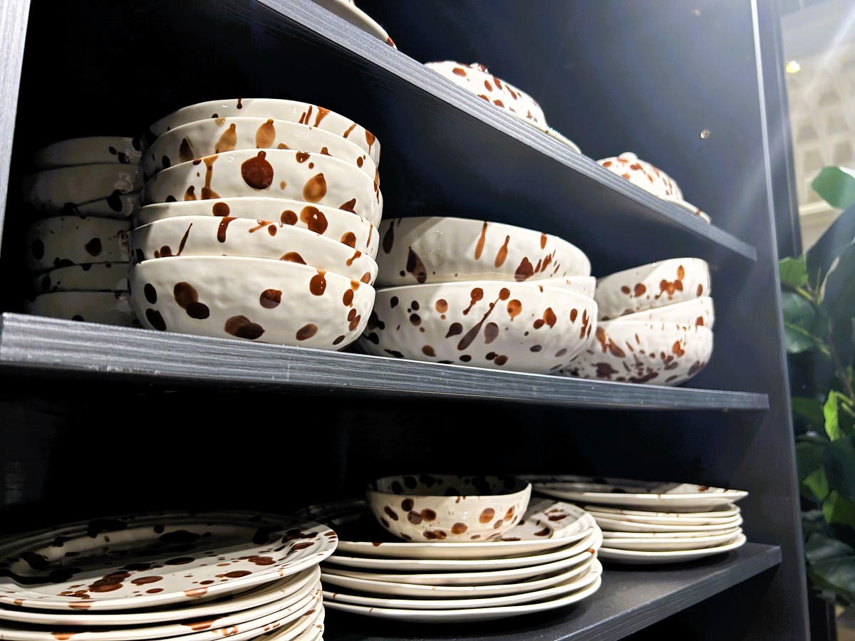 H&M's new Speckled-Glaze crockery range, featuring a brown speckled pattern, has been ridiculed by shoppers for resembling poo. Despite the jokes, some find the design cute.