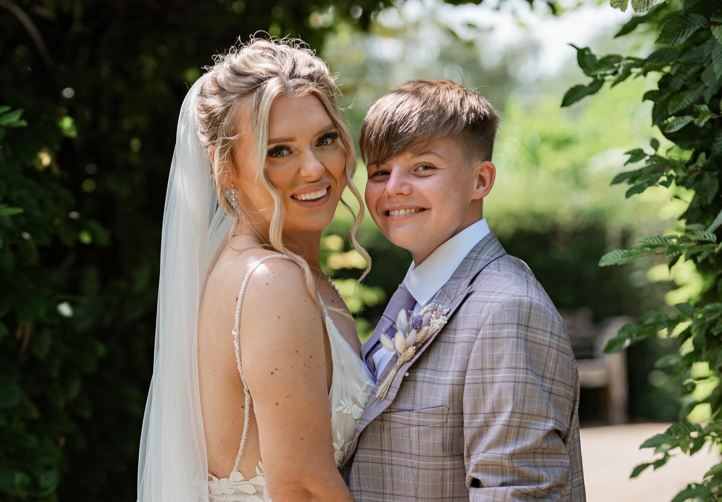 British influencer Lauren Evens faces cruel online trolling after sharing wedding photos with wife Hannah Kaye, but the couple remains strong, focusing on IVF and their future.