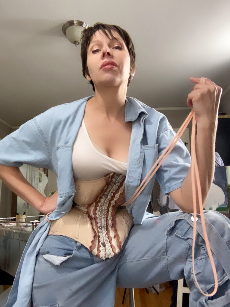 A 49-year-old woman aims to break the Guinness World Record for the smallest waist by tightlacing her corset 23 hours a day, hoping to shrink her waist to 14.7 inches by 2025.