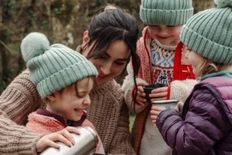 Mum-of-three Tess Lathey embraces a relaxed parenting style, allowing her kids to make their own choices on food, entertainment, and screen time, promoting independence and self-growth.