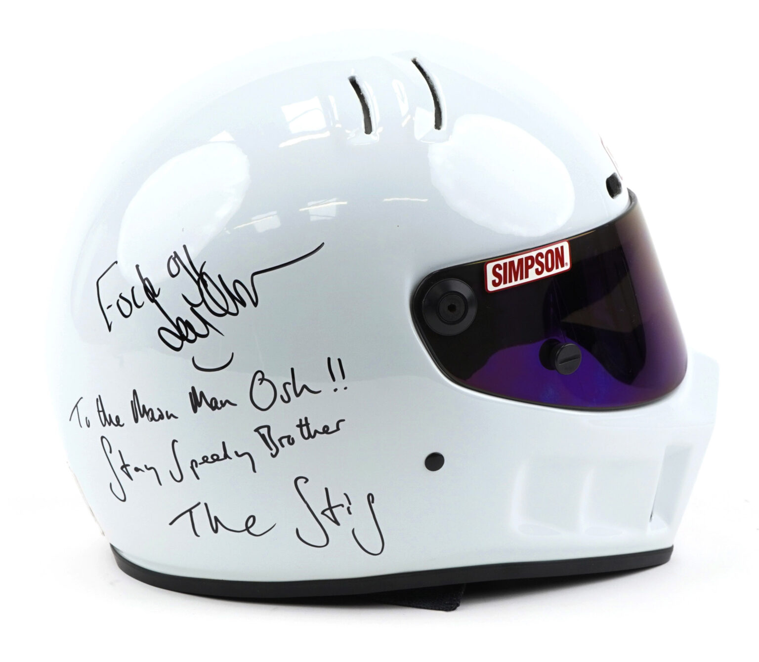 A helmet signed by Jeremy Clarkson with "F*ck off," intended for producer Oisin Tymon after their 2015 altercation, sold for £3,800 at auction, exceeding expectations.