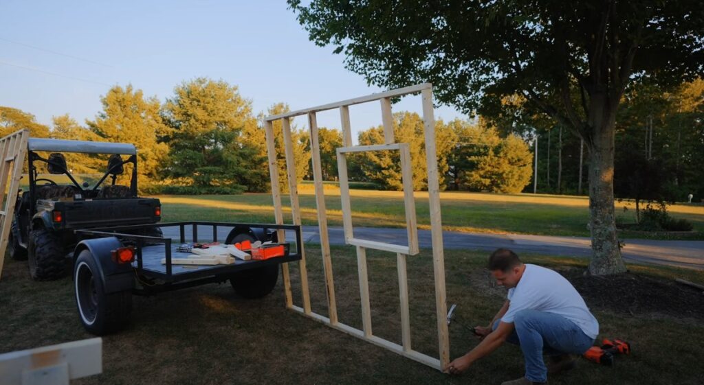 A man has built the ‘world's smallest tiny home,’ measuring just 19.46 sq ft, complete with a bed, kitchen, shower, and toilet, aiming to break a Guinness World Record.