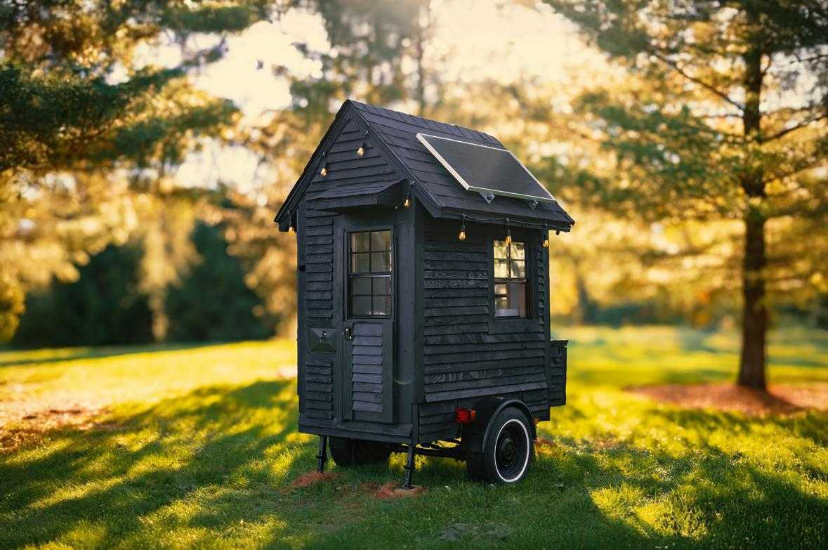 A man has built the ‘world's smallest tiny home,’ measuring just 19.46 sq ft, complete with a bed, kitchen, shower, and toilet, aiming to break a Guinness World Record.